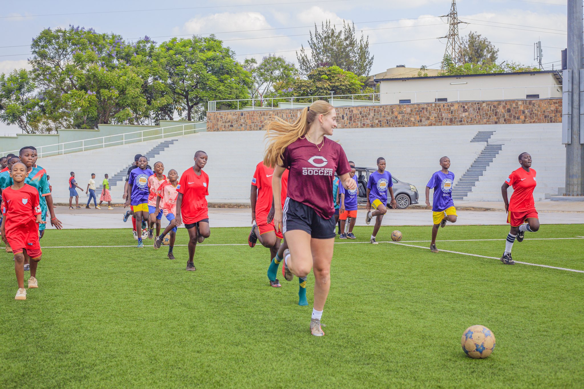 Youth football training session with coaches